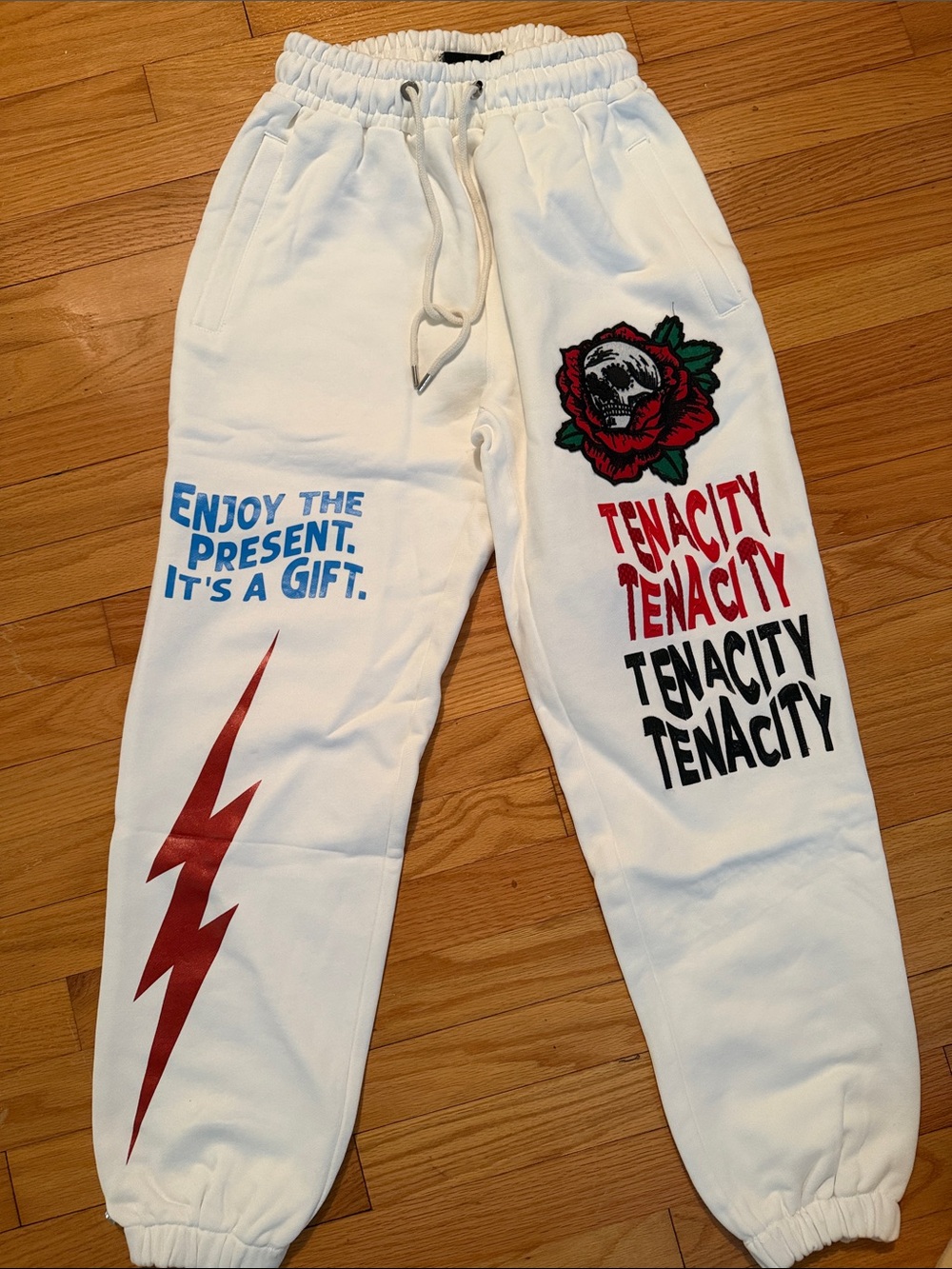 White Graphic Tenacity Jogger Sweatpants with Rose & Lightning Prints
